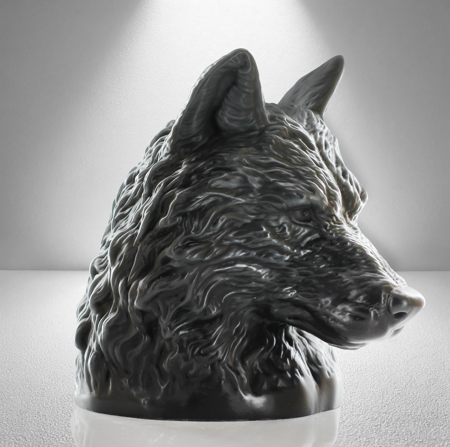 Large grey unscented candle shaped like a wolf's head, featuring intricate fur details and a bold, majestic design.