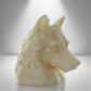 45 degree side view of large soy unscented candle shaped like a wolf's head, featuring intricate fur details and a bold, majestic design.